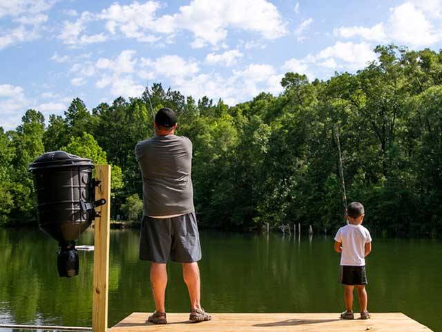 A man and boy fishing