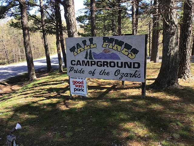 Welcome sign at Tall Pines Campground