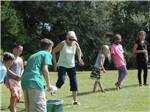 People playing egg toss at GREEN ACRES FAMILY CAMPGROUND - thumbnail