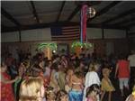 Campers dressed for a luau party at GREEN ACRES FAMILY CAMPGROUND - thumbnail