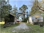 Two of the rustic rental cabins at GREEN ACRES FAMILY CAMPGROUND - thumbnail