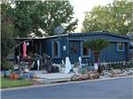 View larger image of Office with decorations and potted plants outside at SAFARI MOBILE HOME  RV COMMUNITY image #7
