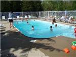 View larger image of People playing in the swimming pool at DEER RIDGE CAMPING RESORT image #3