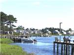 View larger image of Boats docked on a pier at TOMS COVE PARK image #1
