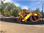 View larger image of Playground with swing set at SNAKE RIVER RV PARK AND CAMPGROUND image #2