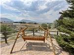 View larger image of Rocking bench overlooking majestic views at PONDEROSA CAMPGROUND image #6
