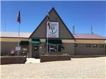 View larger image of The front entrance building at OASIS RV RESORT  COTTAGES - DURANGO image #10