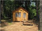 Lodging area with picnic tables at WAKEDA CAMPGROUND - thumbnail