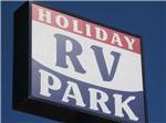 View larger image of Sign leading into campground at HOLIDAY RV PARK  CAMPGROUND image #1
