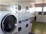View larger image of Laundry room with washer and dryers at RAPID CITY RV PARK AND CAMPGROUND image #9