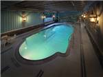 View larger image of The indoor pool at night at LAKE GEORGE RV PARK image #9