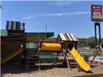 A play structure on the playground at Happy Holiday RV Resort - thumbnail