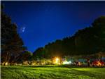 Tents under the trees with the sun beaming thru at WAFFLE FARM CAMPGROUNDS - thumbnail