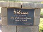 View larger image of The black and gold welcome plaque  at CENTURY RV PARK  CAMPGROUND image #11