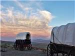 View larger image of Covered wagons at sunset at MT VIEW RV ON THE OREGON TRAIL image #1