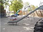 View larger image of Playground with swing set and slide at MT VIEW RV ON THE OREGON TRAIL image #7
