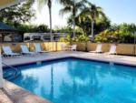 View larger image of The fenced in pool area at PORT ST LUCIE RV RESORT image #1