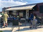 View larger image of People sitting around an RV at COUNTRYSIDE RV PARK image #4