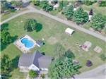 View larger image of Aerial view of pool and main campground building at SUMMER BREEZE CAMPGROUND  RV PARK image #2