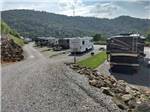 A row of gravel pull thru RV sites at MAMA GERTIE'S HIDEAWAY CAMPGROUND - thumbnail