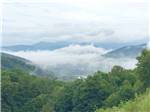 View larger image of A view of the valley with clouds at MAMA GERTIES HIDEAWAY CAMPGROUND image #9