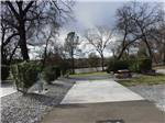 A paved back in RV site at JGW RV PARK - thumbnail