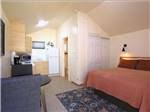 The bedroom in the vacation rental at CASEY'S RIVERSIDE RV PARK - thumbnail