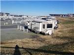 View larger image of Aerial view of trailers lined up in a row along raceway at CAMPING WORLD RACING RESORT image #2