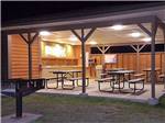 The pavilion lit up at night at CHEYENNE RV RESORT BY RJOURNEY - thumbnail