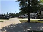 Road leading to RVs parked on-site at FERNBROOK PARK - thumbnail