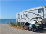 View larger image of RV at campsite with ocean view at FIESTA KEY RV RESORT image #6