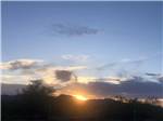 A view of the beautiful sunset at THE SCENIC ROAD RV PARK - thumbnail