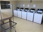 View larger image of Laundry room with washers at QUAIL RUN RV PARK image #3