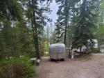 Parked travel trailer at Outback Montana RV Park & Campground - thumbnail