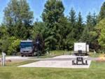 Parked RV's at site Sun Outdoors Petoskey Bay Harbor - thumbnail