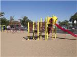 The colorful playground equipment at CORONADO VILLAGE RV RESORT - thumbnail