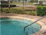 View larger image of The swimming pool awaits its guest at FISHERMANS COVE GOLF  RV RESORT image #6