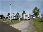RVs and trailers at campground at HEE HEE ILLAHEE RV RESORT - thumbnail
