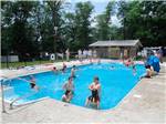 People swimming in pool at WATERSIDE CAMPGROUND & RV PARK - thumbnail