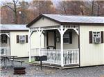A row of rental cabins at WATERSIDE CAMPGROUND & RV PARK - thumbnail