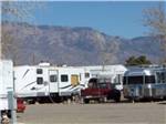 View larger image of Full RV sites with the mountains in the background at BALLOON VIEW RV PARK image #10