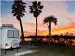 RV parked with a nice sunset view at DELLANERA RV PARK - thumbnail