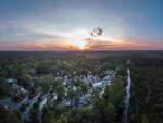 Aerial view of sites at sunset at LIVE OAK LANDING RV PARK - thumbnail