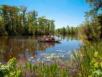 A family fishing on a boat at LIVE OAK LANDING RV PARK - thumbnail