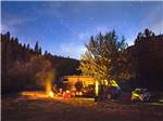 RV camping at night at THOUSAND TRAILS YOSEMITE LAKES - thumbnail