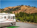 RV parked at campsite at THOUSAND TRAILS PONDEROSA - thumbnail