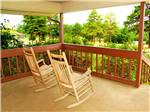 View larger image of Rocking chairs out on the deck at CAROLINA LANDING RV RESORT image #4