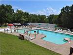 View larger image of Swimming pool with outdoor seating at TIMOTHY LAKE NORTH RV PARK image #6