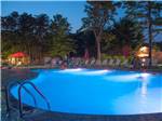 View larger image of Swimming pool with outdoor seating at THOUSAND TRAILS SEA PINES image #2