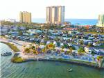 An aerial view from the water of the RV sites at PENSACOLA BEACH RV RESORT - thumbnail